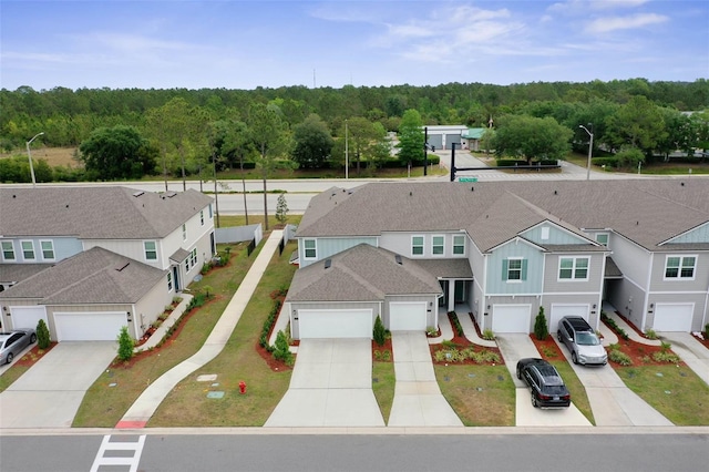 155 Redbud Rd, Palm Coast, FL 32137 - aerial perspective of suburban area with a forest
