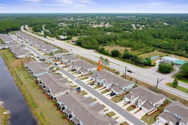 155 Redbud Rd, Palm Coast, FL 32137 - aerial view of residential area with a large body of water