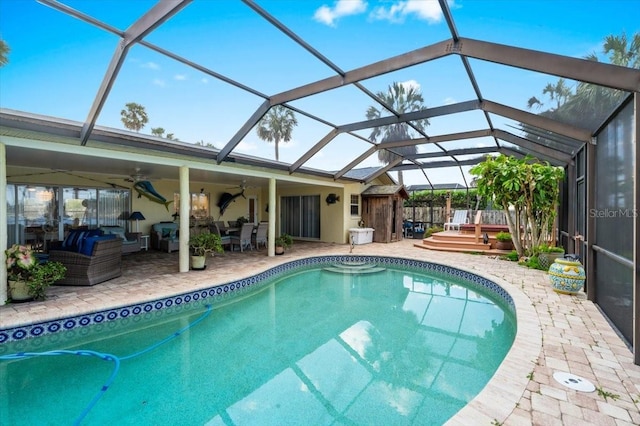 940 Lambert Ave, Flagler Beach, FL 32136 - outdoor pool with an outdoor hangout area, a ceiling fan, a patio, and glass enclosure