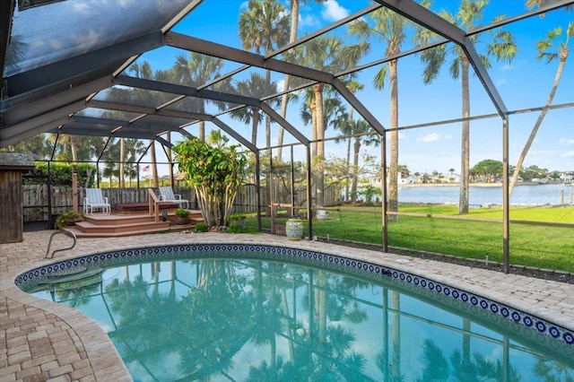 940 Lambert Ave, Flagler Beach, FL 32136 - outdoor pool with a lawn, a deck with water view, a lanai, and a patio