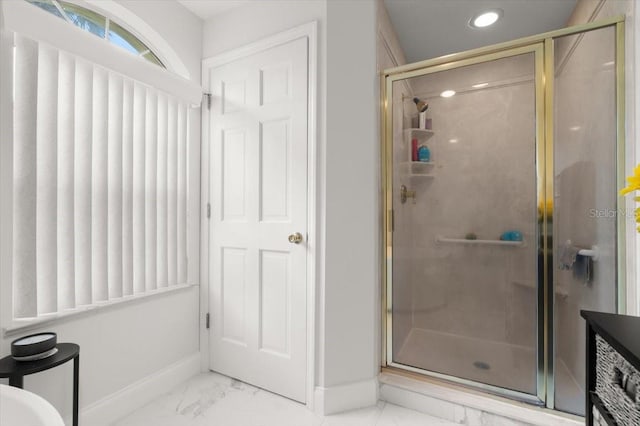 940 Lambert Ave, Flagler Beach, FL 32136 - full bath featuring marble finish floors, baseboards, a stall shower, and recessed lighting