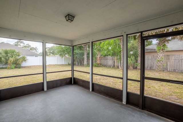 unfurnished sunroom with plenty of natural light