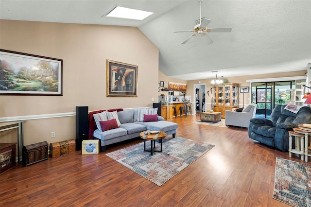 27 Black Hawk Pl, Palm Coast, FL 32137 - living area featuring ceiling fan, wood finished floors, a chandelier, and high vaulted ceiling