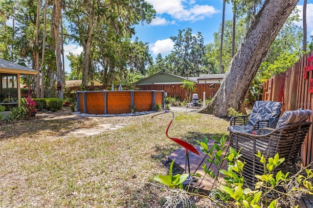 27 Black Hawk Pl, Palm Coast, FL 32137 - view of yard with a swimming pool