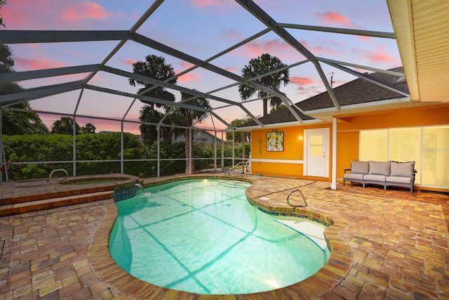 2 Cleveland Ct, Palm Coast, FL 32137 - view of swimming pool with a patio, outdoor lounge area, a pool with connected hot tub, and glass enclosure