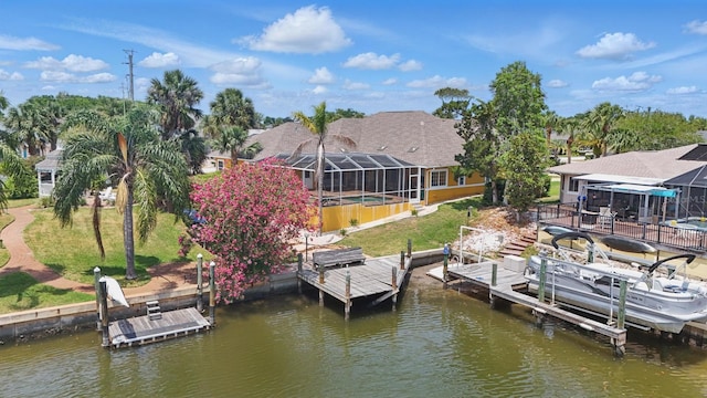 2 Cleveland Ct, Palm Coast, FL 32137 - dock area with boat lift, a water view, a swimming pool, and a lanai