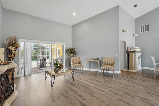 2 Cleveland Ct, Palm Coast, FL 32137 - living area with high vaulted ceiling and wood finished floors