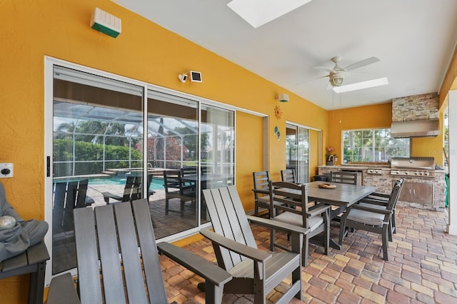 2 Cleveland Ct, Palm Coast, FL 32137 - view of patio featuring area for grilling, a ceiling fan, outdoor dining area, glass enclosure, and a pool with connected hot tub