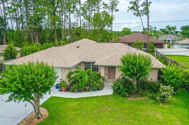 10 Eastwood Dr, Palm Coast, FL 32164 - ranch-style house with stucco siding, a shingled roof, and an attached garage