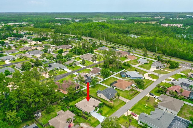 10 Eastwood Dr, Palm Coast, FL 32164 - aerial view of property and surrounding area with a forest and nearby suburban area
