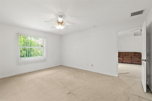 10 Eastwood Dr, Palm Coast, FL 32164 - empty room featuring ceiling fan, light carpet, and baseboards