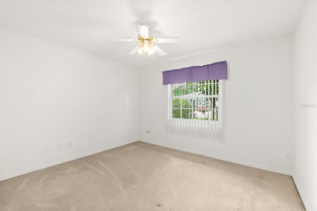 10 Eastwood Dr, Palm Coast, FL 32164 - carpeted spare room featuring baseboards and ceiling fan