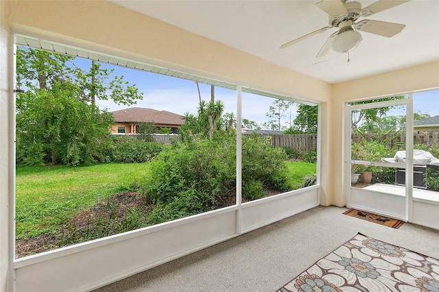 10 Eastwood Dr, Palm Coast, FL 32164 - unfurnished sunroom featuring a ceiling fan