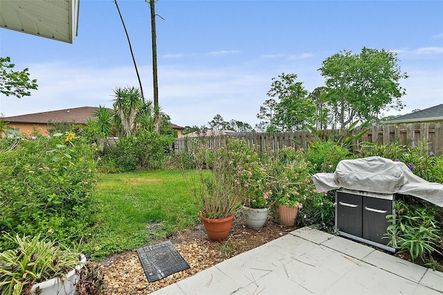 10 Eastwood Dr, Palm Coast, FL 32164 - fenced backyard featuring a patio