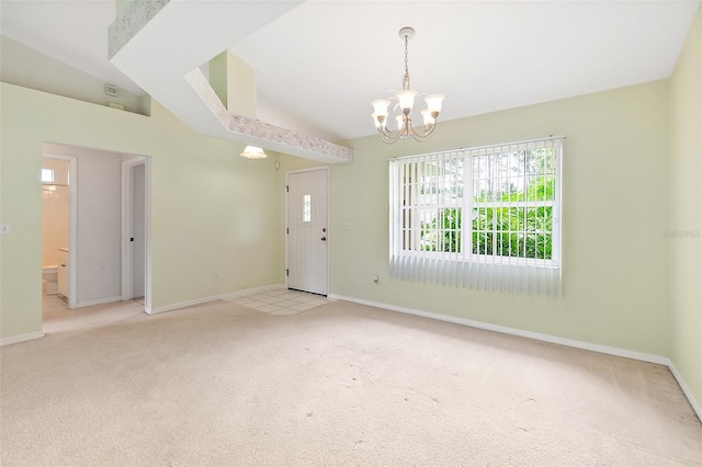 10 Eastwood Dr, Palm Coast, FL 32164 - unfurnished room featuring light colored carpet, healthy amount of natural light, a chandelier, and baseboards