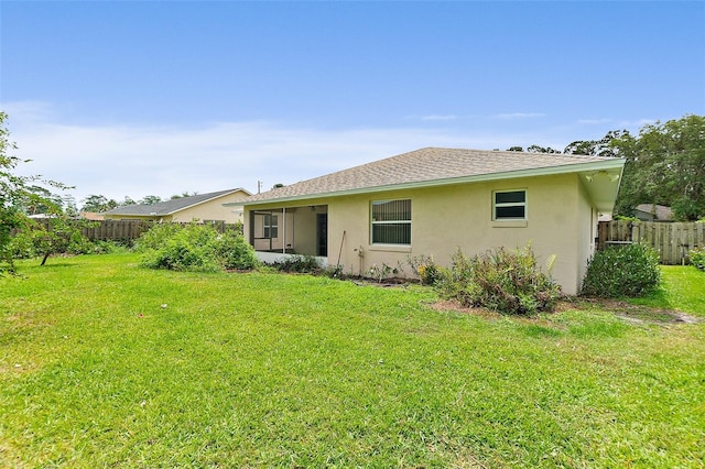 10 Eastwood Dr, Palm Coast, FL 32164 - rear view of property featuring stucco siding