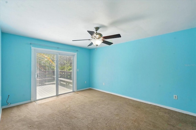 120 Oak Ln, Flagler Beach, FL 32136 - spare room featuring carpet flooring, ceiling fan, and baseboards