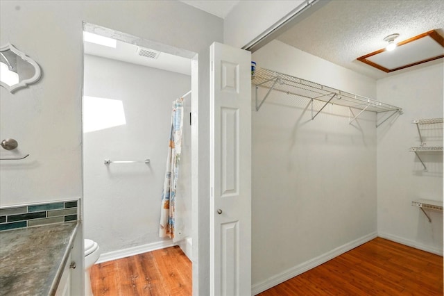 120 Oak Ln, Flagler Beach, FL 32136 - walk in closet with wood finished floors