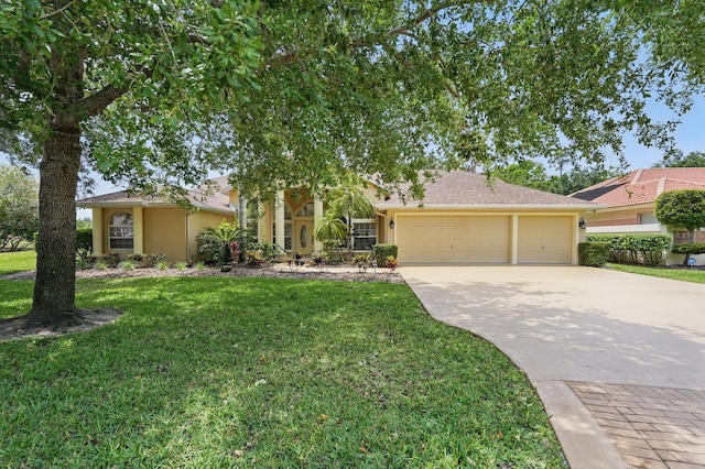 47 Old Oak Dr S, Palm Coast, FL 32137 - view of front of home with concrete driveway, an attached garage, a front lawn, and stucco siding