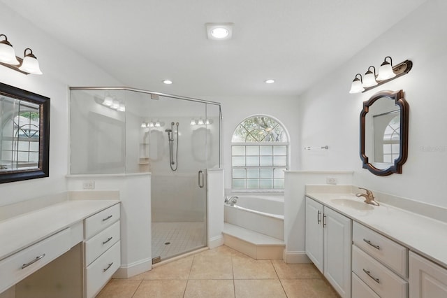 47 Old Oak Dr S, Palm Coast, FL 32137 - full bathroom featuring vanity, tile patterned flooring, a stall shower, a garden tub, and recessed lighting