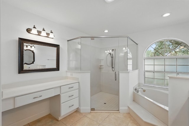 47 Old Oak Dr S, Palm Coast, FL 32137 - full bathroom featuring a bath, a stall shower, tile patterned floors, vanity, and recessed lighting