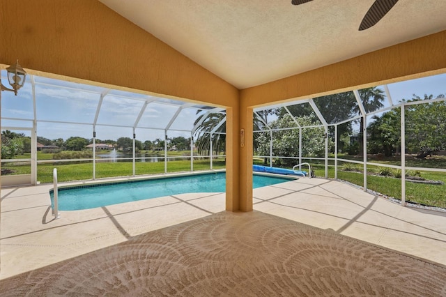 47 Old Oak Dr S, Palm Coast, FL 32137 - outdoor pool with a lanai, a patio, ceiling fan, a yard, and view of wooded area