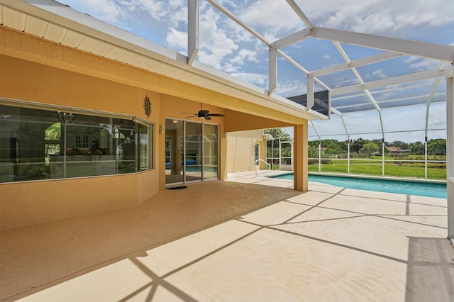 47 Old Oak Dr S, Palm Coast, FL 32137 - swimming pool featuring a patio, ceiling fan, and glass enclosure