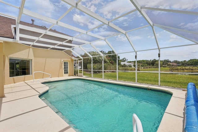47 Old Oak Dr S, Palm Coast, FL 32137 - outdoor pool featuring a patio area, glass enclosure, and a yard