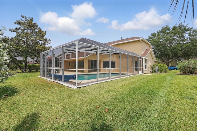 47 Old Oak Dr S, Palm Coast, FL 32137 - back of property with a lawn and an outdoor pool