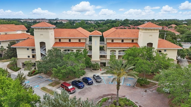 200 Bella Harbor Ct Unit 105, Palm Coast, FL 32137 - view of property with uncovered parking