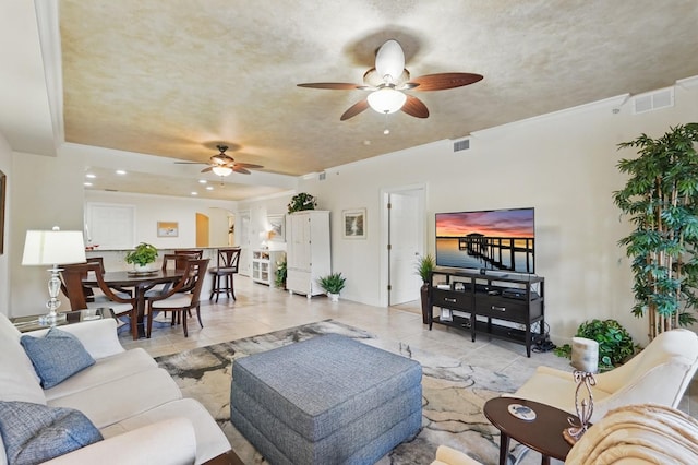200 Bella Harbor Ct Unit 105, Palm Coast, FL 32137 - living area featuring a ceiling fan and light tile patterned floors