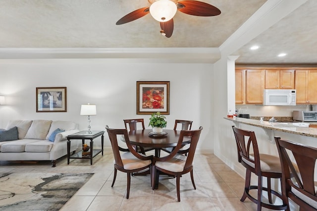200 Bella Harbor Ct Unit 105, Palm Coast, FL 32137 - dining space with recessed lighting, light tile patterned floors, ceiling fan, and baseboards