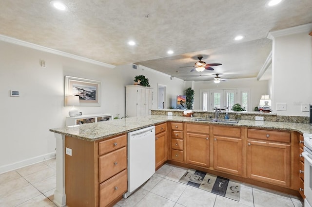 200 Bella Harbor Ct Unit 105, Palm Coast, FL 32137 - kitchen with white appliances, a sink, light stone counters, ceiling fan, and crown molding
