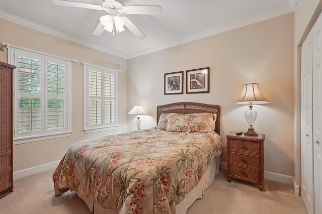 200 Bella Harbor Ct Unit 105, Palm Coast, FL 32137 - carpeted bedroom featuring baseboards, a closet, ornamental molding, and ceiling fan