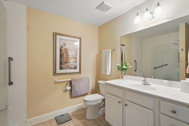 200 Bella Harbor Ct Unit 105, Palm Coast, FL 32137 - bathroom featuring toilet, tile patterned flooring, baseboards, vanity, and a shower