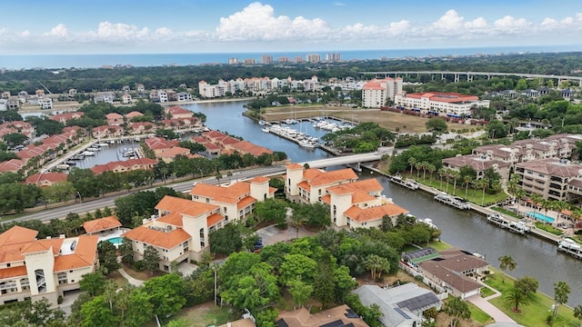 200 Bella Harbor Ct Unit 105, Palm Coast, FL 32137 - aerial view of residential area featuring a large body of water and a notable bridge