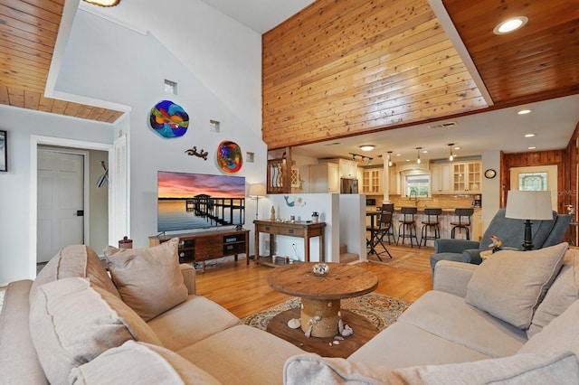 1819 S Flagler Ave, Flagler Beach, FL 32136 - living area with light wood finished floors, wooden ceiling, recessed lighting, and high vaulted ceiling
