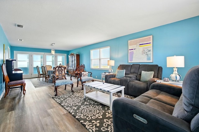 7029 N Ocean Shore Blvd, Palm Coast, FL 32137 - living area with wood finished floors and baseboards