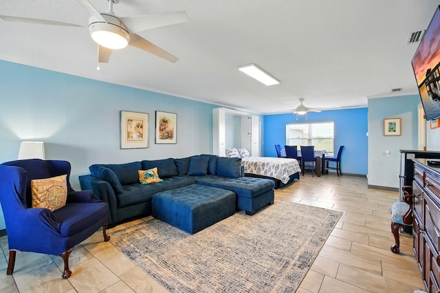 7029 N Ocean Shore Blvd, Palm Coast, FL 32137 - living room with ceiling fan and crown molding