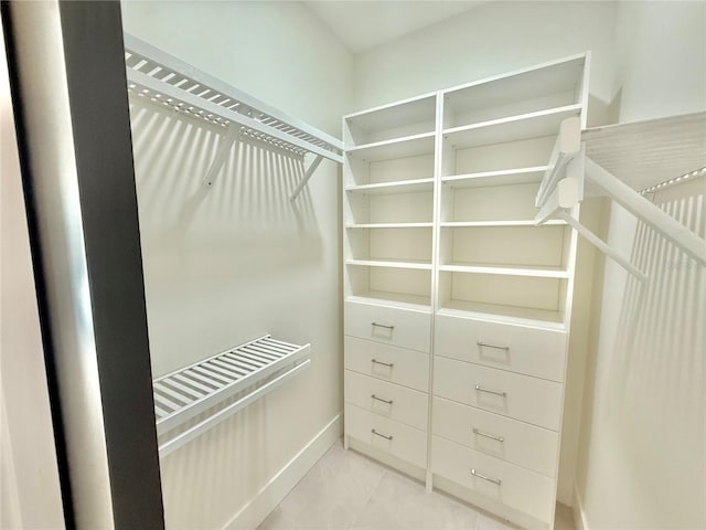 807 N Flagler Ave, Flagler Beach, FL 32136 - spacious closet featuring tile patterned flooring