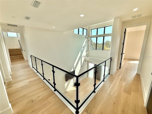 807 N Flagler Ave, Flagler Beach, FL 32136 - stairs with wood finished floors, recessed lighting, and baseboards