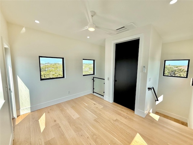 807 N Flagler Ave, Flagler Beach, FL 32136 - spare room with baseboards, light wood-style flooring, ceiling fan, and recessed lighting