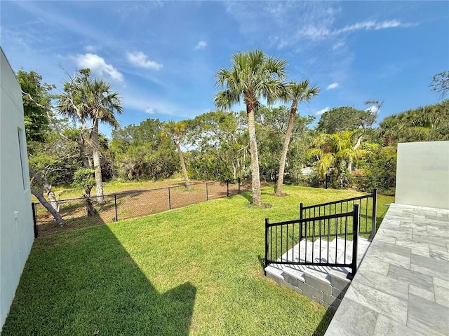807 N Flagler Ave, Flagler Beach, FL 32136 - view of yard with a patio area