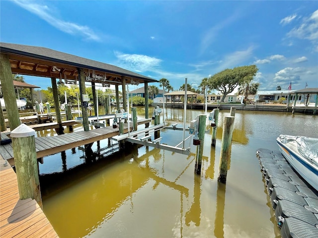 807 N Flagler Ave, Flagler Beach, FL 32136 - dock area featuring boat lift and a water view