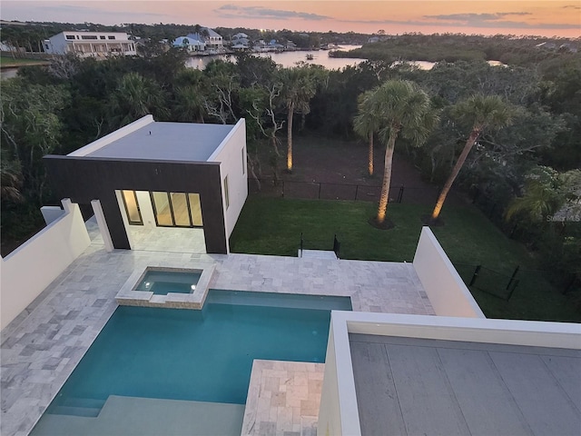 807 N Flagler Ave, Flagler Beach, FL 32136 - view of pool with a patio and a pool with connected hot tub