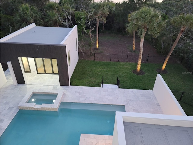 807 N Flagler Ave, Flagler Beach, FL 32136 - view of pool with a pool with connected hot tub and a patio