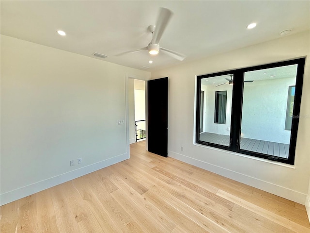 807 N Flagler Ave, Flagler Beach, FL 32136 - unfurnished room featuring ceiling fan, baseboards, wood finished floors, and recessed lighting