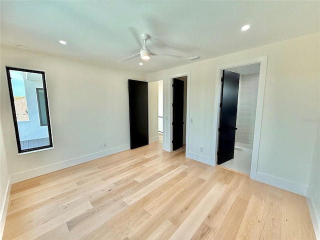 807 N Flagler Ave, Flagler Beach, FL 32136 - unfurnished bedroom with light wood finished floors, baseboards, recessed lighting, and a ceiling fan