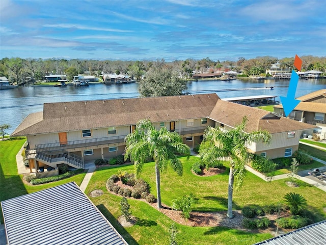 view from above of property with a large body of water