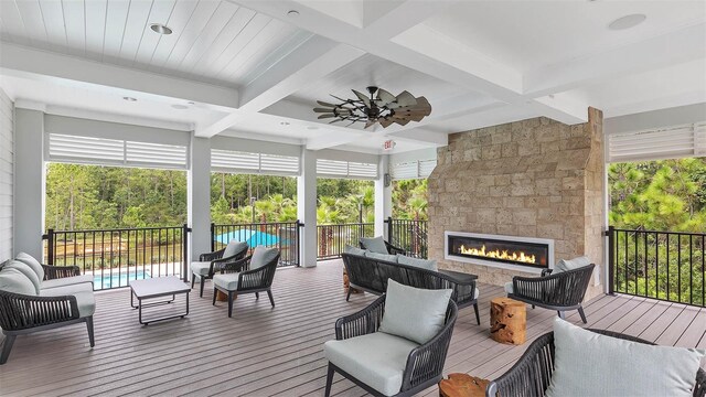 804 Grand Reserve Dr, Bunnell, FL 32110 - wooden deck featuring an outdoor living space with a fireplace